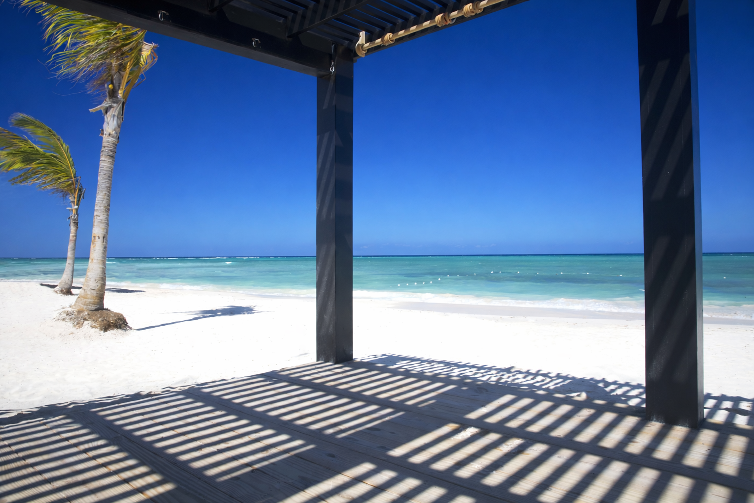 Tropical beach under pergola shade